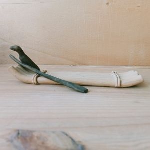 Okimono tenpai zattera, remo e cormorano